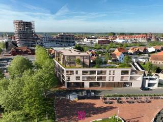 Schitterend nieuwbouwappartement met twee slaapkamers, en een aangenaam open zicht, gelegen in de stijlvolle nieuwbouwresidentie "Maurice" vlakbij Duinenwater en het station van Knokke-Heist.<br /><br />Dit gezellig appartement met ruim terras is gelegen op de eerste verdieping en omvat:<br />Inkomhal met gastentoilet, lichtrijke leefruimte met een gezellige zit- en eethoek, moderne open keuken voorzien van de nodige toestellen, berging en een overdekt buitenterras. Verder zijn er 2 ruime slaapkamers en een mooi afgewerkte badkamer met inloopdouche. Mogelijkheid tot aankoop van een makkelijk toegankelijke autostaanplaats, bereikbaar via een autolift in de residentie. Verkoop onder stelsel van BTW.