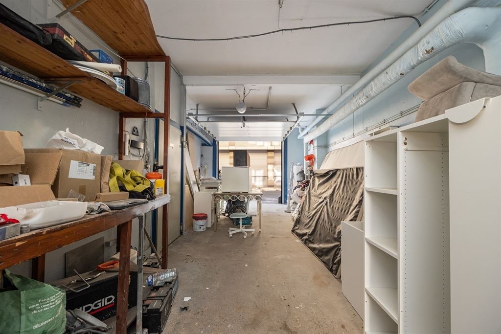 Woonst met ruim magazijn pal in de stad - foto 3