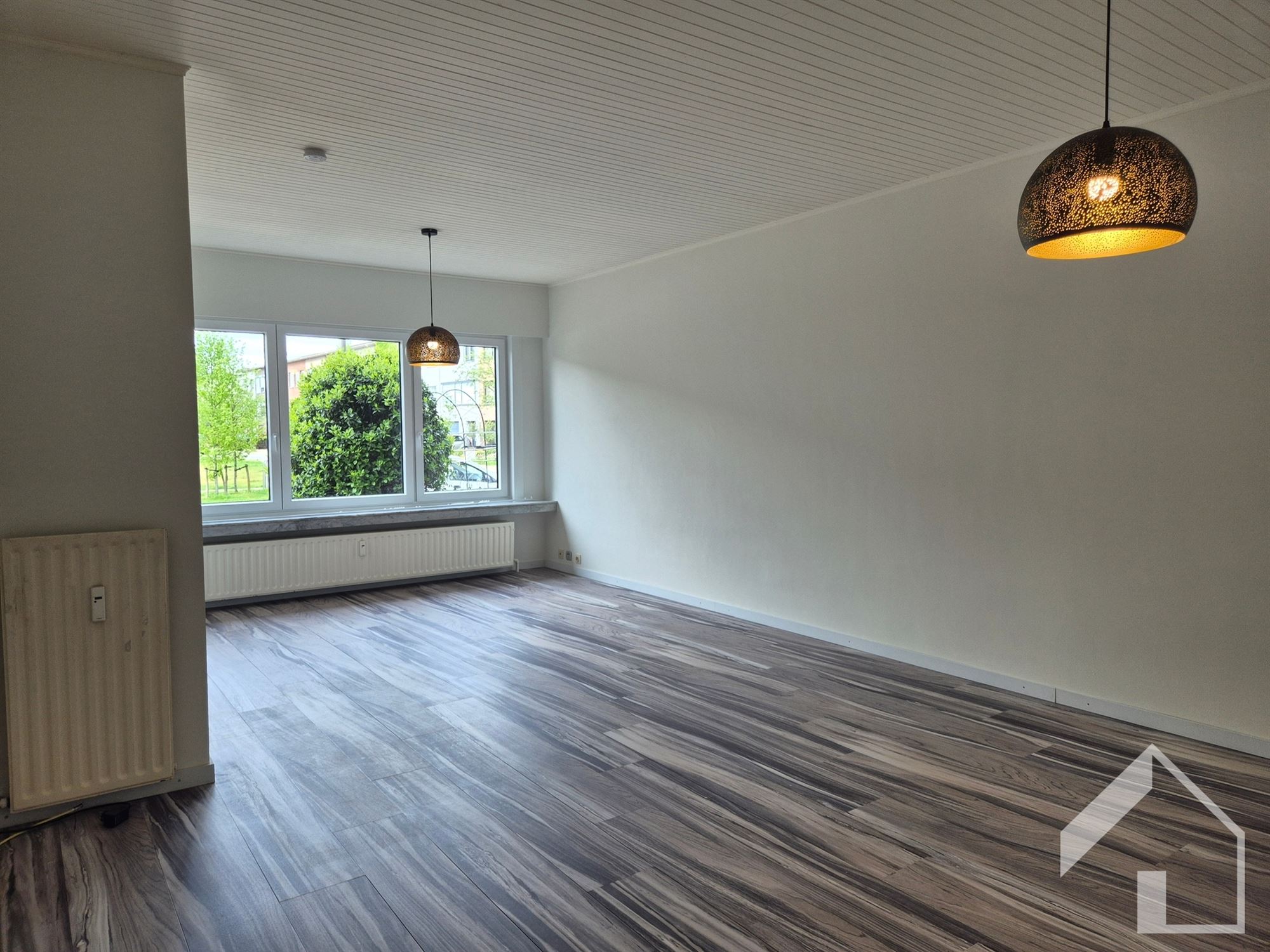 gelijkvloersappartement met 2 slaapkamers, tuin en garage - foto 5