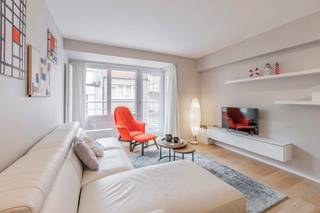 Nice holiday flat near the beach and the lively centre of ‘t Zoute!Entrance hall with cloakroom and toilet. Living room with extra sofa bed and open...