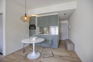 The ready-to-move-in studio is located in the cozy theater neighborhood. A perfect location for those who like to live centrally near, among other things, the Bird Market. The student neighborhood is also nearby. The proximity to public transport and major access roads ensure good accessibility to and from Antwerp. Numerous cozy restaurants and shops are in the immediate vicinity.<br /><br />The bright studio with a view of some greenery is located at the rear. The apartment has a living area of 36 m² with an ideal layout.<br /><br />Layout:<br />- entrance hall <br />- living space with lots of light through the full-width windows <br />- kitchen with all necessary appliances<br />- sleeping corner<br />- bathroom, walk-in shower, sink, toilet and connection for washing machine and dryer.<br /><br /> There is a communal bicycle shed in the building. <br /><br />This studio is offered for sale at a price of 199.000 Euro. <br /><br />Are you interested in an apartment or house for sale in Antwerp? Don't hesitate to contact us. <br />If you would like to sell your own property, please contact us for a free estimate, by phone at 03/206.76.76 or by email to antwerpen@dewaele.com.<br /><br />You can also always contact our office in Antwerp for all other questions about real estate!<br /><br />Register of measures: no