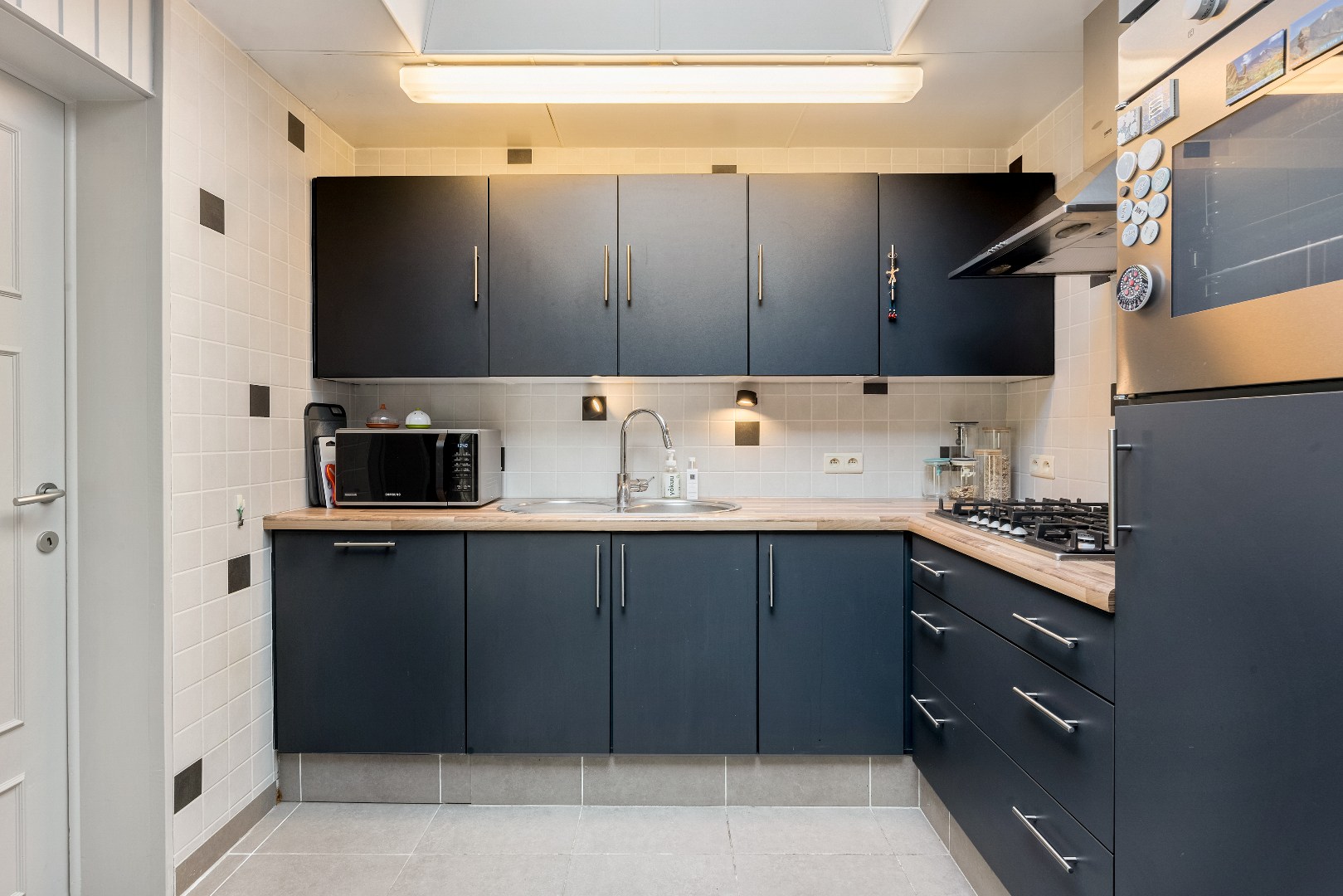 Gezellige rijwoning met charmante, zuidwest georiënteerde koer - foto 4