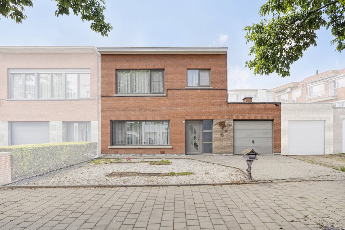 Te koop in Merksem: huis met 3 slaapkamers, garage en tuin - foto 1