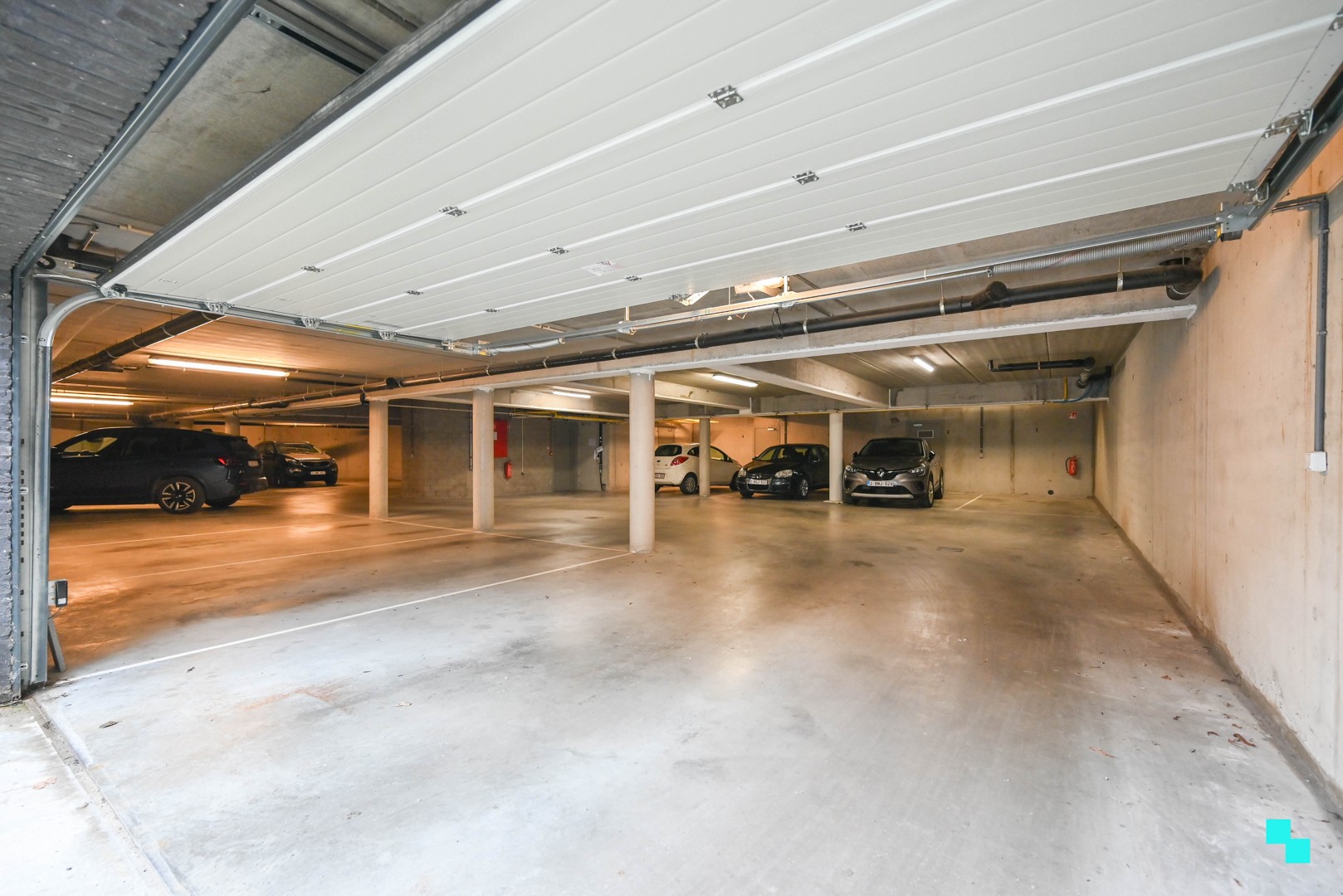 5 ondergrondse parkeerplaatsen in het hart van Oostrozebeke - foto 1