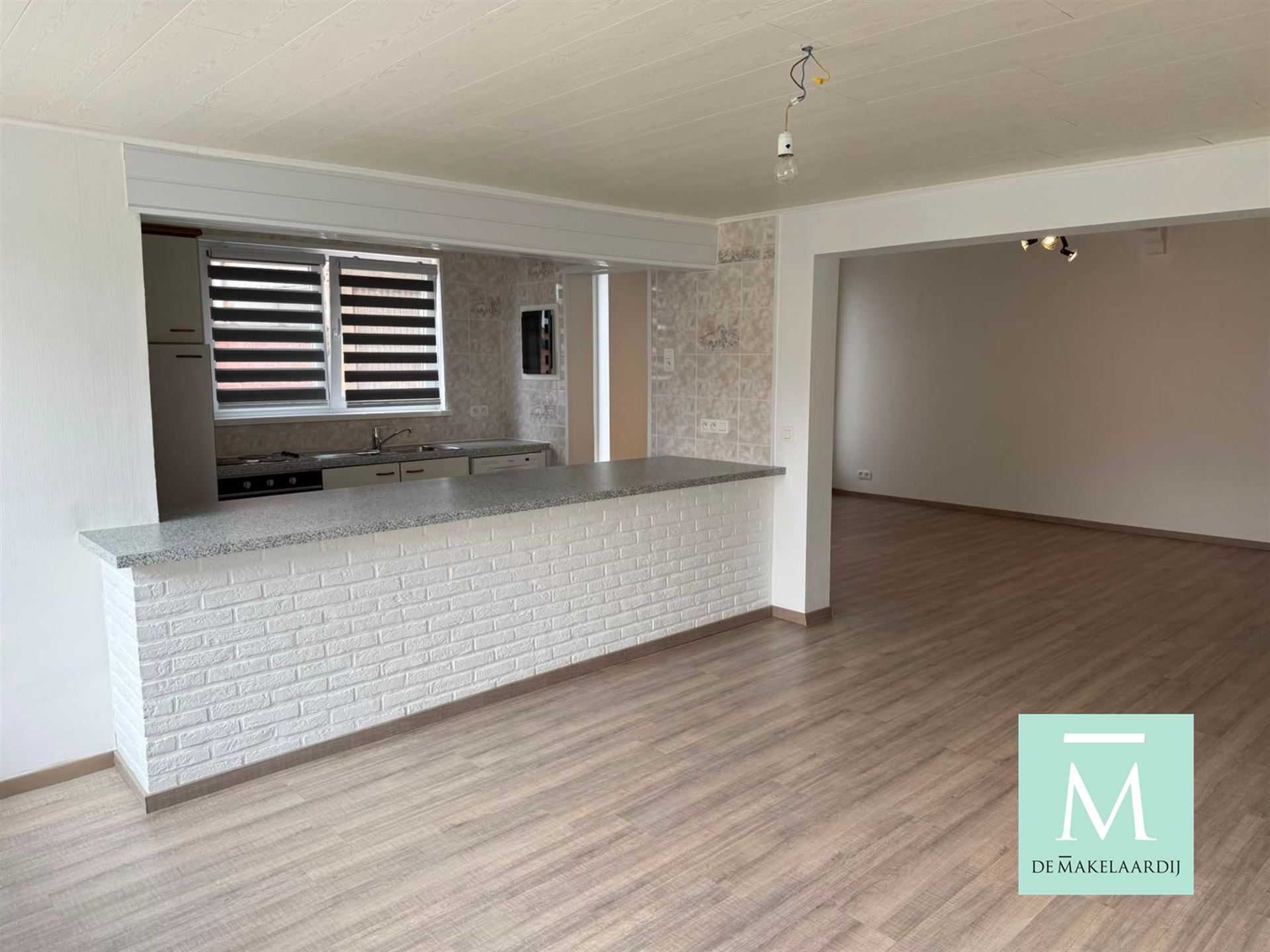Instapklaar gelijkvloersappartement met 2 grote slaapkamers en tuin - foto 3