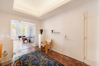 Stylish renovated flat in the heart of Antwerp – 2 bedrooms, 2 bathrooms, parking available<br /><br />In the bustling heart of Antwerp city centre, behind a beautiful 10-metre-wide Art Deco façade, you will find this characterful and ready-to-move-in flat. A rare combination of charm, space and comfort, right in the middle of the city.<br /><br />Upon entering, you are immediately struck by the abundance of light, thanks to the wide façade and large windows. The living space exudes style and authenticity, with subtle references to the original Art Deco architecture, while everything has been finished to perfection for contemporary living comfort.<br /><br />The property has two full bedrooms, each with its own bathroom – ideal for those who love privacy or want to welcome guests in comfort. The kitchen is fully equipped and forms the heart of the flat, perfect for cosy evenings or elaborate dinners.<br /><br />An additional bonus is the possibility of a parking space for sale at 45.000 euro, a real luxury in this central location.<br /><br />All amenities – shops, restaurants, public transport and culture – are within walking distance. Yet inside, you can enjoy peace, space and quality.<br /><br />This flat is perfect for those looking for stylish living in the city centre, or for those who want to invest in a carefree property in a prime location.