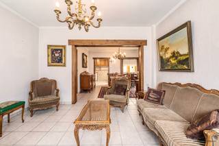 <p><span> Located </span><span>on </span><span>Houwstraat in Beerzel</span><span> is this surprisingly spacious home with approximately </span><span>120 m² of living space</span><span>, three bedrooms, a garage, a garden, and a </span><span>separate studio of approximately 20 m</span><span>². Built in 1953, the home offers a great foundation for anyone looking for a spacious home with the potential to modernize it to their own taste.</span></p><p><span>On the ground floor is a </span><span>spacious and bright living area</span><span> with a sitting and dining area. Large windows provide pleasant natural light, and the charming fireplace adds extra ambiance to the space. Adjacent to this is the kitchen.</span></p><p><span>Also on the ground floor are the </span><span>bathroom with a bathtub</span><span>, a practical laundry room, and the garage.</span></p><p><span>There are </span><span>two bedrooms</span><span>on the first floor </span><span>. The attic has been converted into </span><span>a third bedroom</span><span>, providing a nice addition to the home’s sleeping quarters.</span></p><p><span>There is also plenty of extra space outside. The </span><span>fenced-in backyard</span><span> features both a lawn and paved areas. At the back of the yard is a </span><span>separate building of approximately 20 m² that serves as a workshop</span><span>. Ideal for hobbyists or DIY enthusiasts, or for anyone who needs a separate work or storage space at home.</span></p><p><span>The home could be modernized in various ways but features an interesting layout and plenty of potential. The combination of the living space, garage, garden, and separate studio makes this a versatile property.</span></p><h3><span>Highlights</span></h3><ul><li><span>Approx. </span><span>120 m² of living space</span></li><li><span>3 bedrooms</span><span>, one of which is in the attic</span></li><li><span>Separate studio of approx. 20 m²</span><span> in the backyard</span></li><li><span>Garage</span></li><li><span>Spacious and bright living area</span></li><li><span>Bathroom on the ground floor</span></li><li><span>Practical laundry room</span></li><li><span>Fenced backyard</span></li><li><span>Plenty of opportunities for modernization</span></li></ul><p><span>Built in </span><span>1953</span></p>