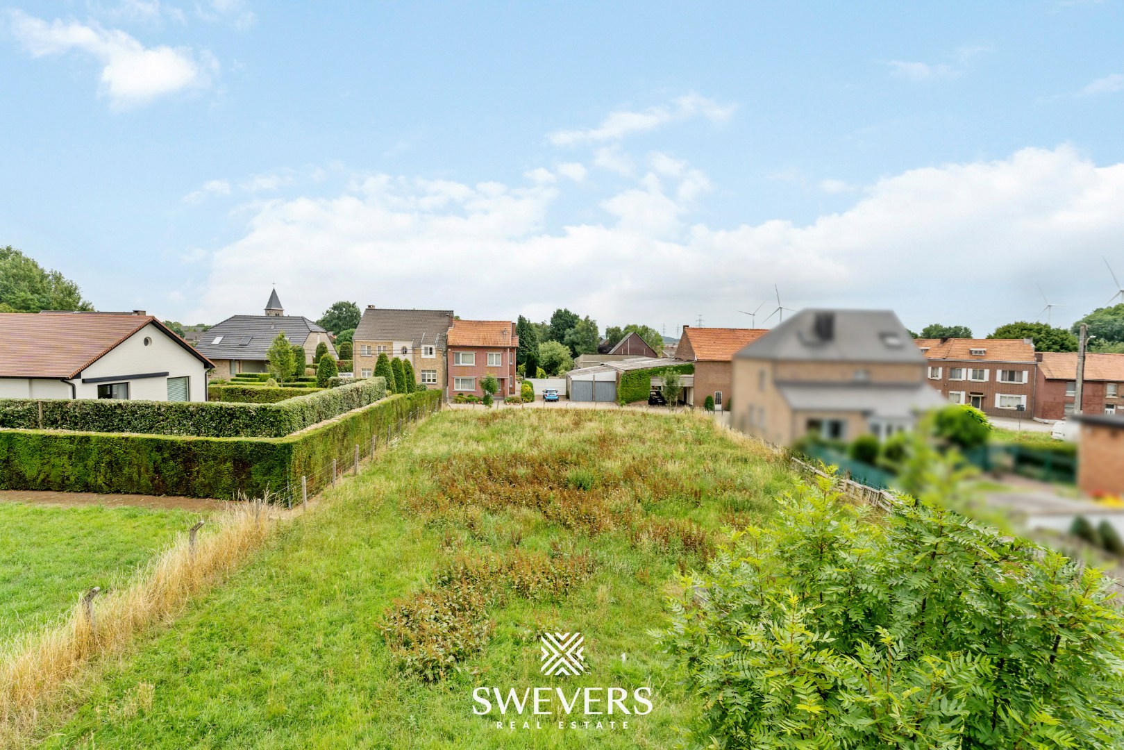 Bouwgrond voor halfopen bebouwing in hartje Riemst - foto 4