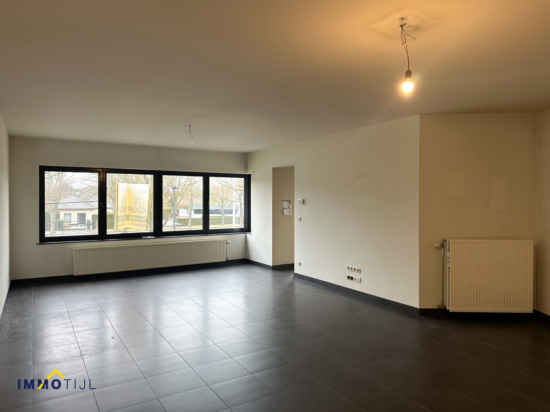 Knap appartement met berging, garage en 2 autostaanplaatsen! - foto 5