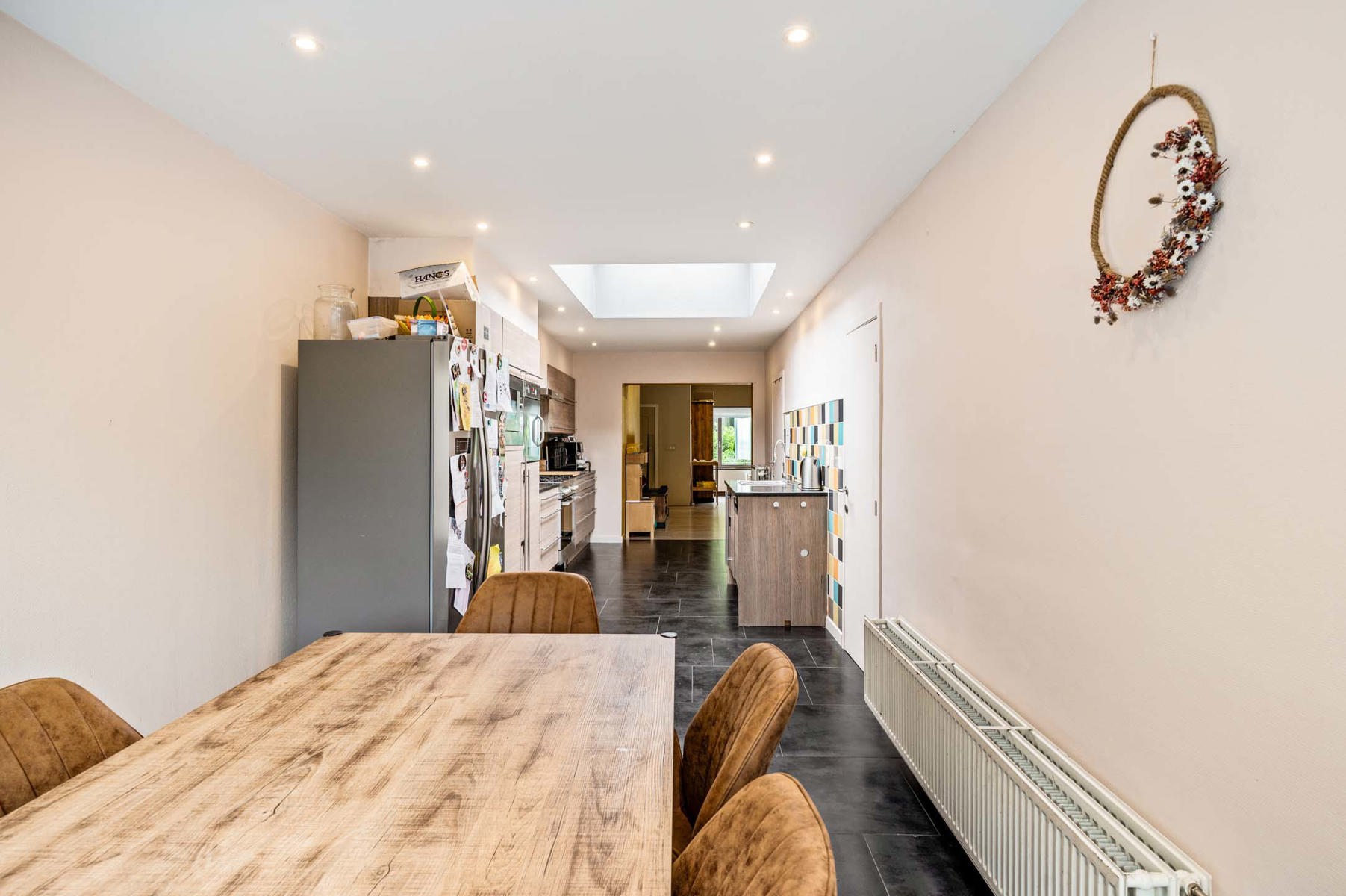 Gezinswoning met 4 slaapkamers, tuin en veel potentieel - foto 5
