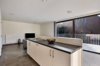 TE KOOP: Prachtig recent appartement met 2 slaapkamers en ondergrondse staanplaats op toplocatie te Heusden!Op zoek naar een energiezuinig en goed...