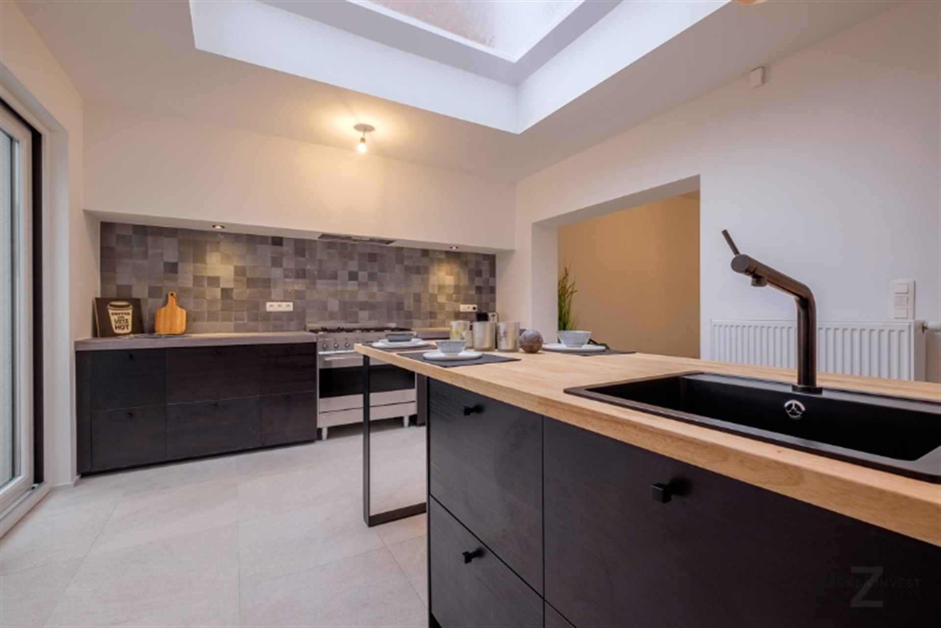 Met zorg gerenoveerde woning gelegen aan stadspark van Aalst - foto 4