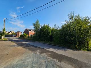 Rustig gelegen perceel bouwgrond voor open bebouwing met een oppervlakte van ± 10a 64ca. Bouwbreedte: ± 12,43m. Enige lot uit een...