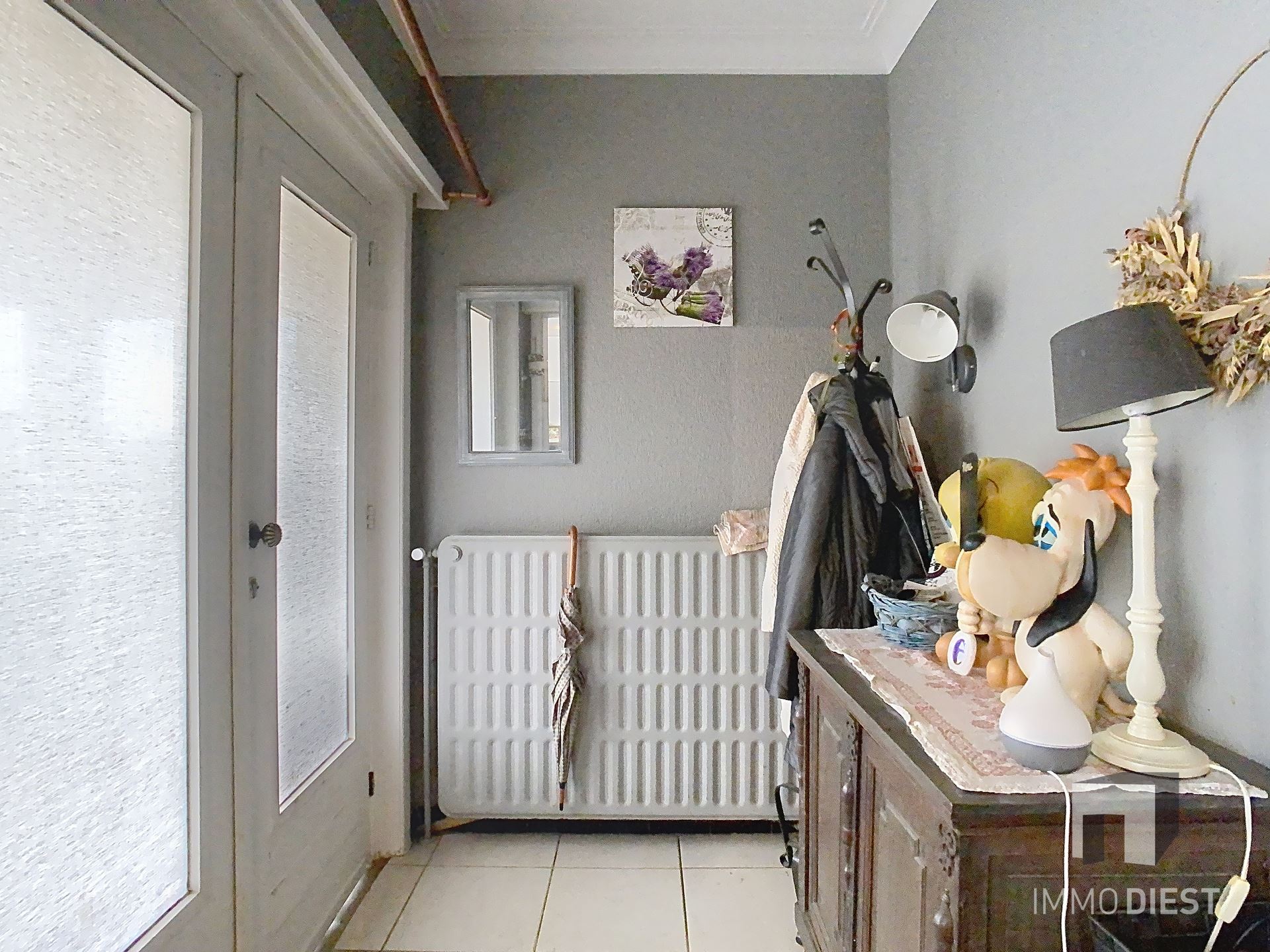 Charmante, op te frissen woning met ruime tuin nabij het centrum van Herselt. - foto 4