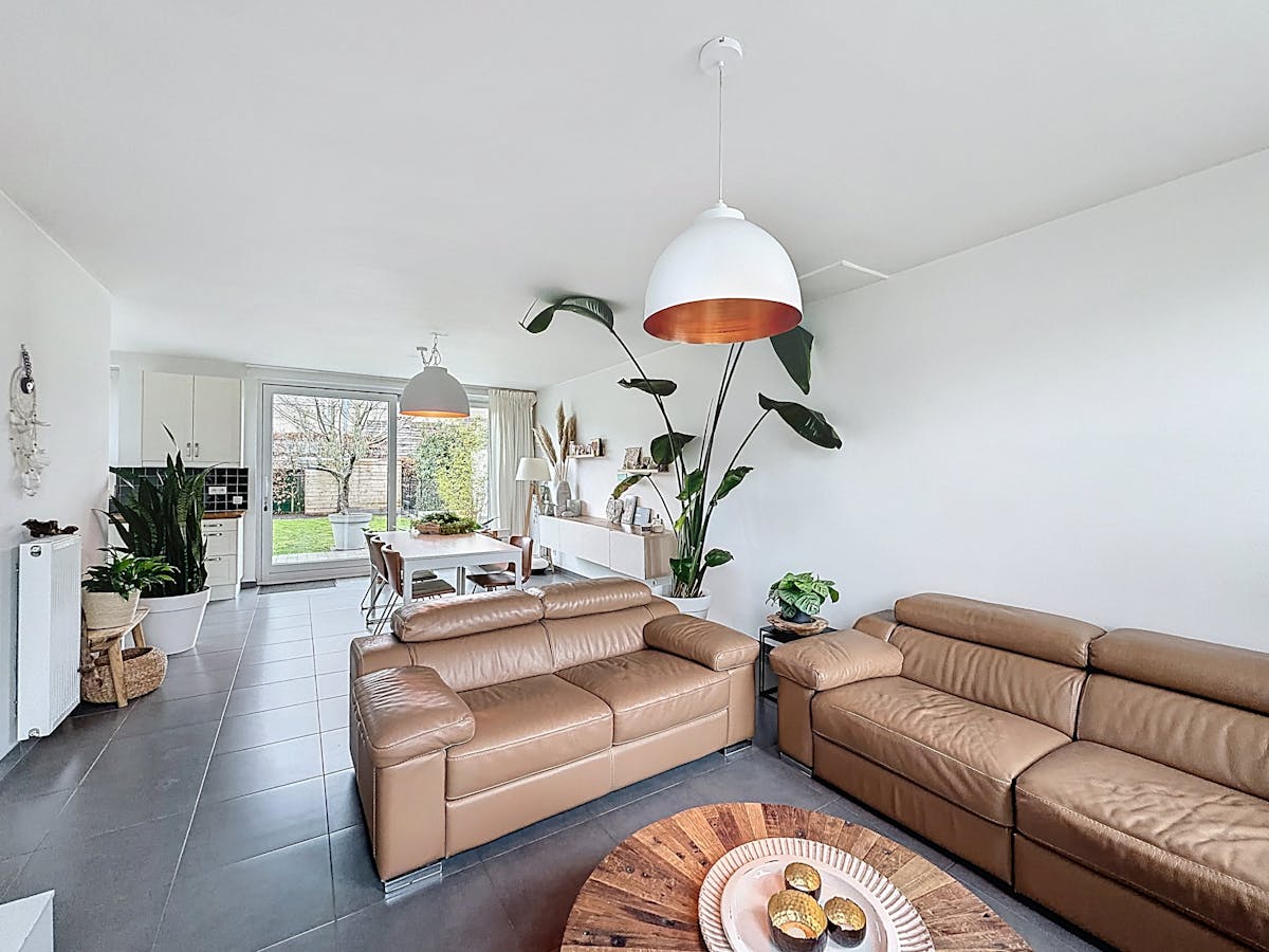 Karaktervolle woning met tuin in rustige wijk te Merelbeke - foto 1