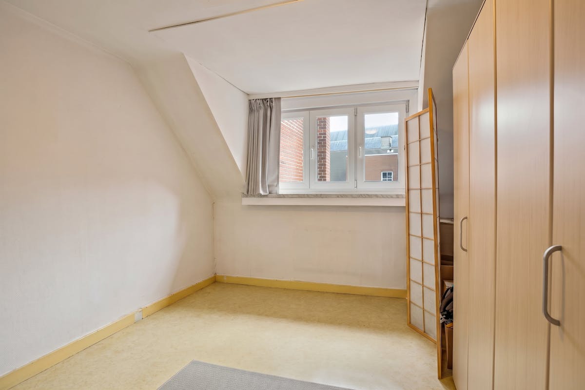 Ruim en veelzijdig huis nabij de Grote Markt van Roeselare. - foto 5