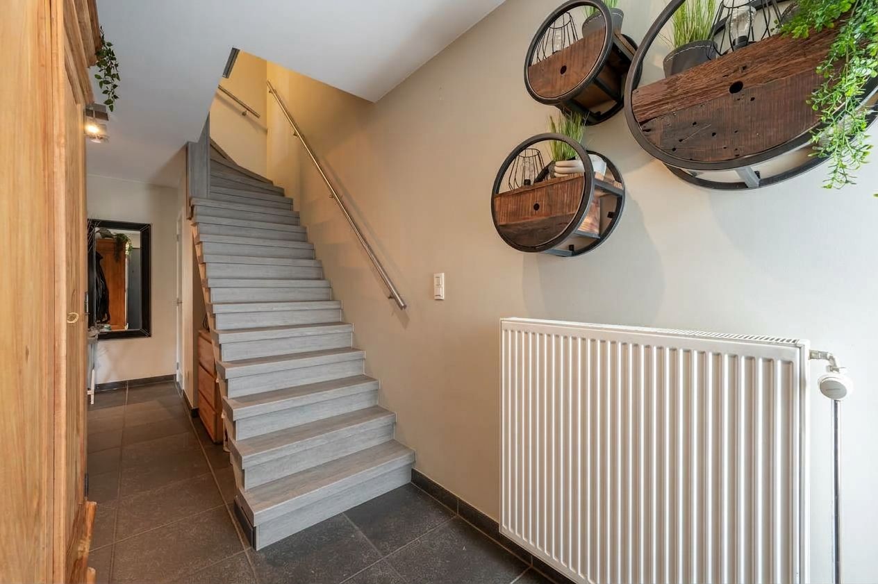 Instapklare halfopen gezinswoning met zongerichte tuin en centrale ligging - foto 5