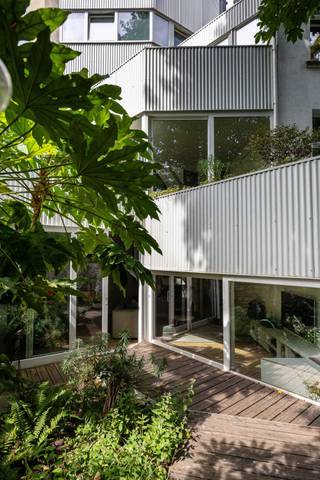 <p>BRUSSELS, ideally located in a quiet one-way street, just 200 metres from the highly sought-after Square Marie-Louise and within walking distance of the European institutions, this elegant Brussels townhouse underwent a complete renovation in 2012 by the award-winning architecture firm Vanden Eeckhoudt-Creyf.<span></span></p>
<p>Beautifully combining original character, light-filled volumes and refined contemporary design, the property offers a rare lifestyle in the very heart of the capital. With a generous gross living area of approximately 375 m², it provides remarkable versatility, making it equally suitable as a prestigious family residence, a mixed-use property or an exceptional long-term real estate investment.</p>
<p>The property also benefits from approximately 65 m² of carefully landscaped private outdoor spaces, offering peaceful and secluded retreats.</p>
<p>In terms of comfort and performance, the house boasts a good energy rating (PEB D), a fully compliant electrical installation and impeccable overall condition, allowing for immediate occupation without additional works. An exclusive property opportunity combining high-end living, tranquillity and a strategic location in the heart of the European Quarter. Possibility to purchase privately or through a company.</p>
<p><span>Ground floor:</span></p>
<ul>
<li>Entrance hall</li>
<li>Spacious fully equipped open-plan kitchen</li>
<li>Central dining room</li>
<li>Generous living room with access to the courtyard and ± 38 m² garden</li>
<li>Guest toilet</li>
</ul>
<p><span>First floor:</span></p>
<ul>
<li>Mezzanine level currently used as an office, with access to a terrace</li>
<li>± 34 m² master bedroom with dressing room and full bathroom including bathtub, shower, washbasins and toilet</li>
</ul>
<p><span>Second floor:</span></p>
<ul>
<li>± 19 m² bedroom with private shower room including shower, washbasin and toilet</li>
<li>± 17 m² bedroom with private shower room including shower, washbasin and toilet</li>
</ul>
<p><span>Third floor</span>: ± 60 m² studio comprising:</p>
<ul>
<li>Living room with access to a terrace</li>
<li>Fully equipped open-plan kitchen with breakfast area</li>
<li>Bathroom with separate toilet</li>
<li>Bedroom on the upper level with access to a terrace</li>
</ul>
<p><span>Basement</span>: ± 18 m² laundry room - ± 17 m² storage cellar and technical cellars</p>