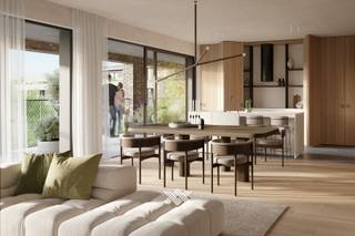 Dit appartement van 143 m² beschikt over een lichtrijke leefruimte met extra hoge plafonds en een zuid gericht terras van 28 m² met uitzicht op...