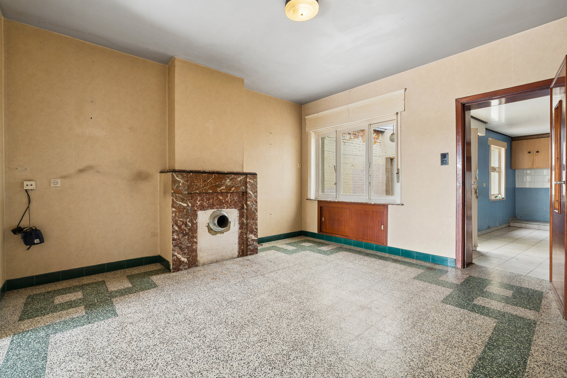 Te renoveren woning met tuin op centrale ligging - foto 4