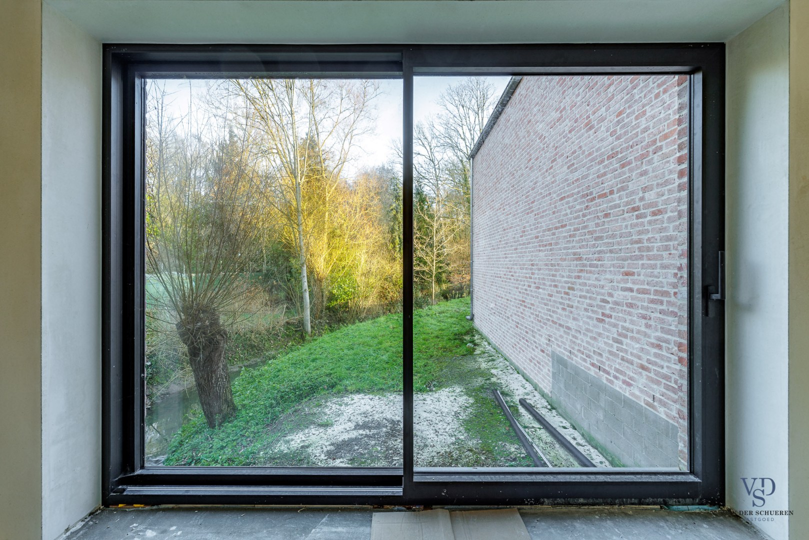 Gelijkvloerse woongelegenheid in hartje Dikkelvenne - foto 3