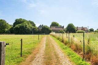 <p>Discover this beautiful rural property in Ellezelles—a truly unique opportunity for those who dream of space, nature, and possibilities. With an impressive area of 9,889 m², this property offers unlimited potential for your future plans.<br />The property is already partially equipped with practical amenities. There are stables with individual stalls, perfect for horses or as excellent storage space for agricultural equipment, vehicles, and supplies. <br />Whether you dream of a recreational property, a small-scale agricultural enterprise, or something entirely different, this spacious lot offers the space and freedom to turn your vision into reality. The location offers a perfect balance between rural tranquility and access to essential amenities.<br />Properties like this are rare and highly sought after. This is an opportunity to own something truly special.</p>