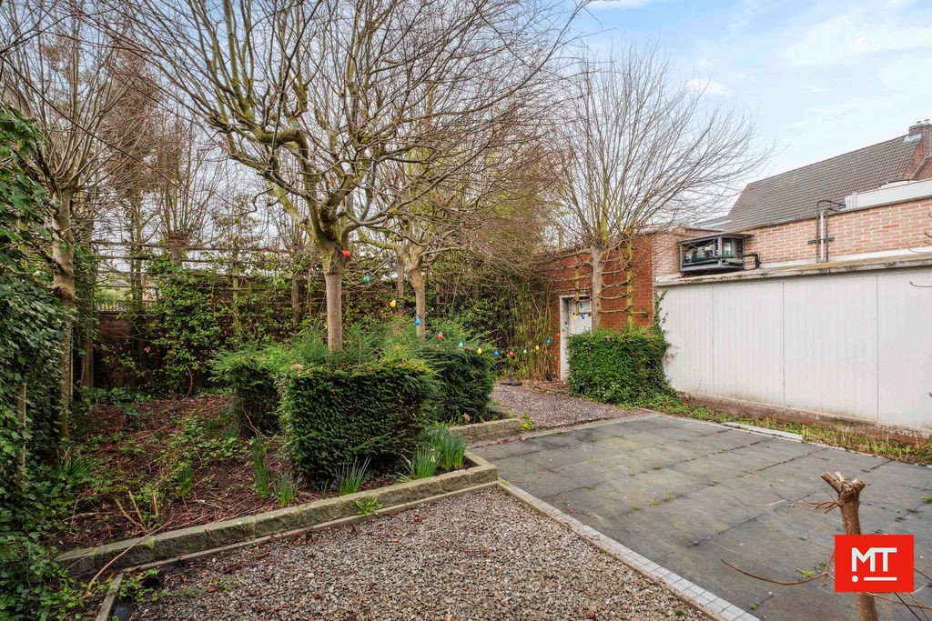 Veelzijdig gebouw bestaande uit handelsruimte, woning en appartement in het centrum van Wervik - foto 4