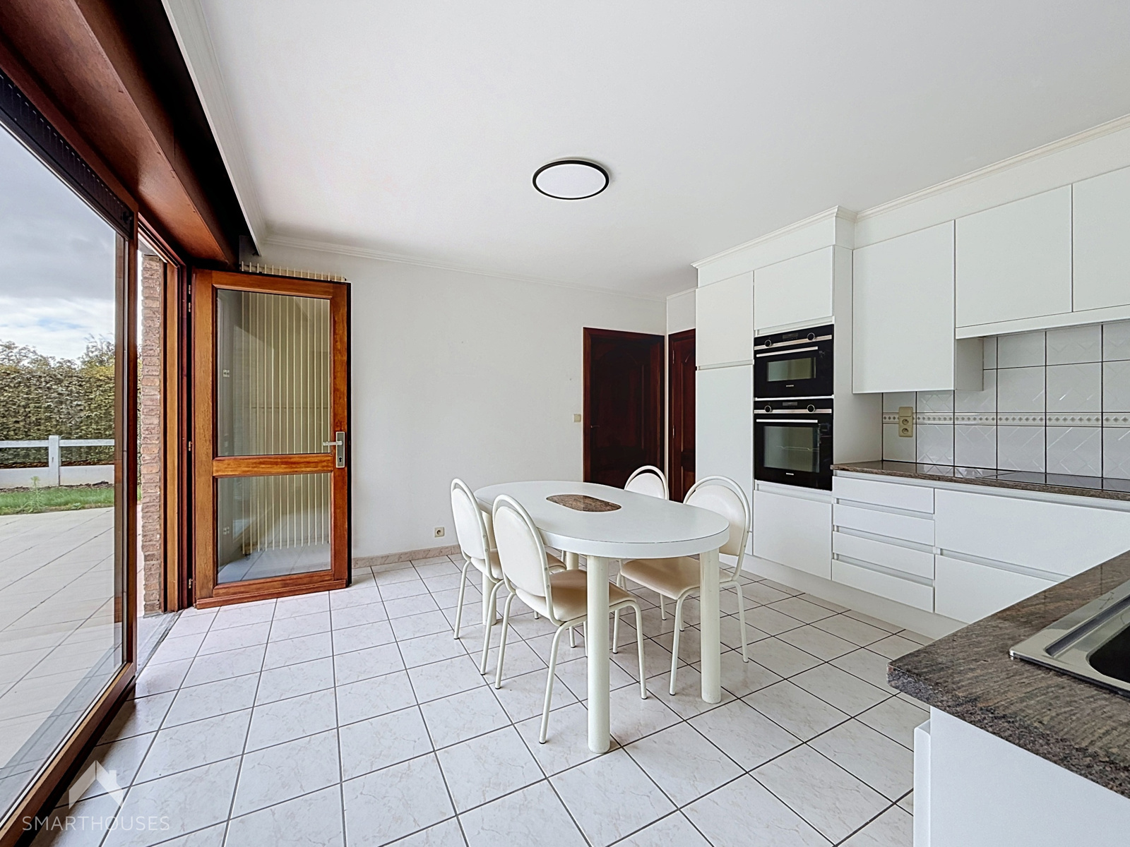 Vrijstaande woning met 2 à 3 slpkrs, garage en tuin - foto 4