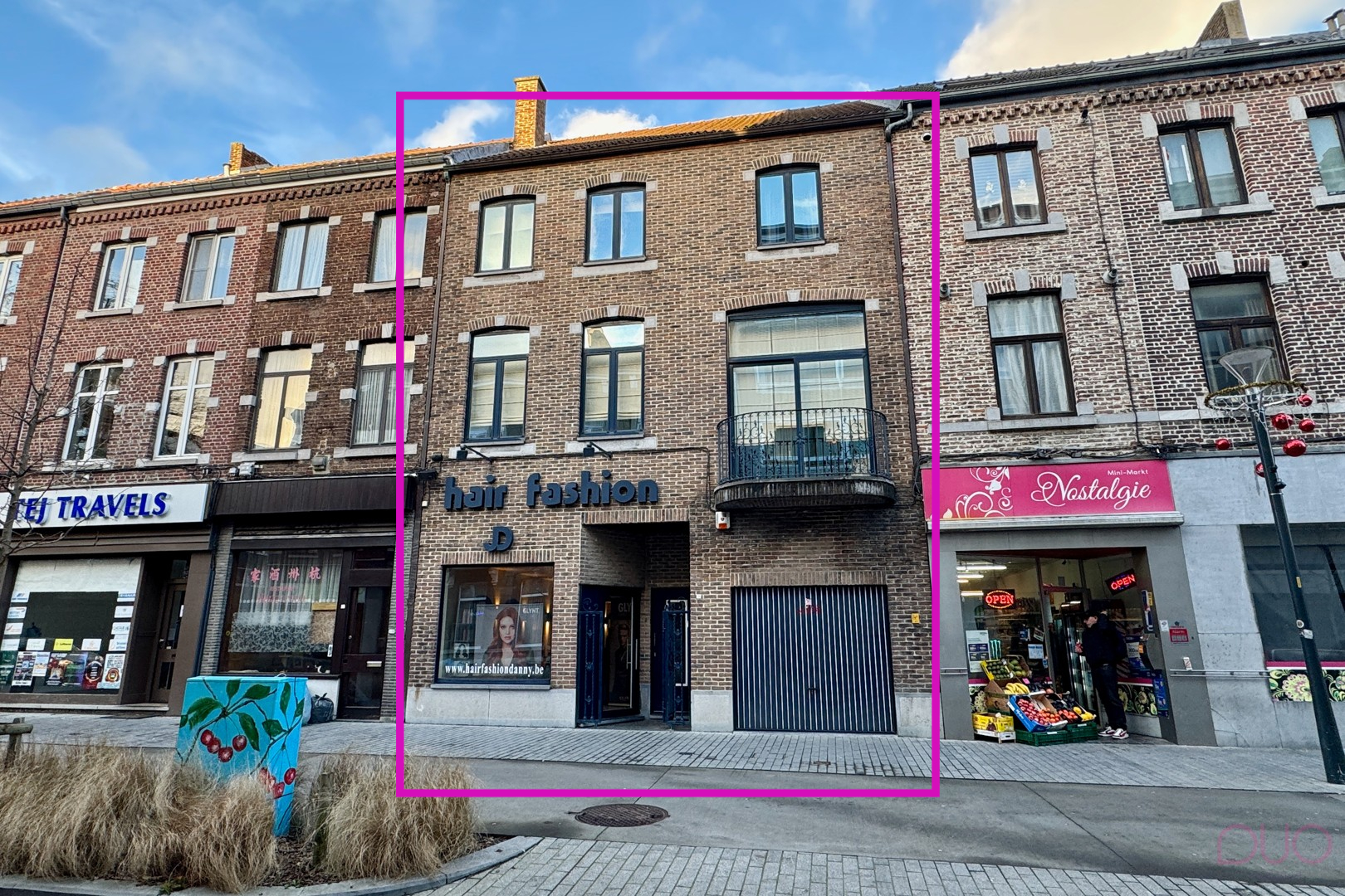 Grote stadswoning met aparte handelsruimte en garage in hartje Sint-Truiden - foto 1