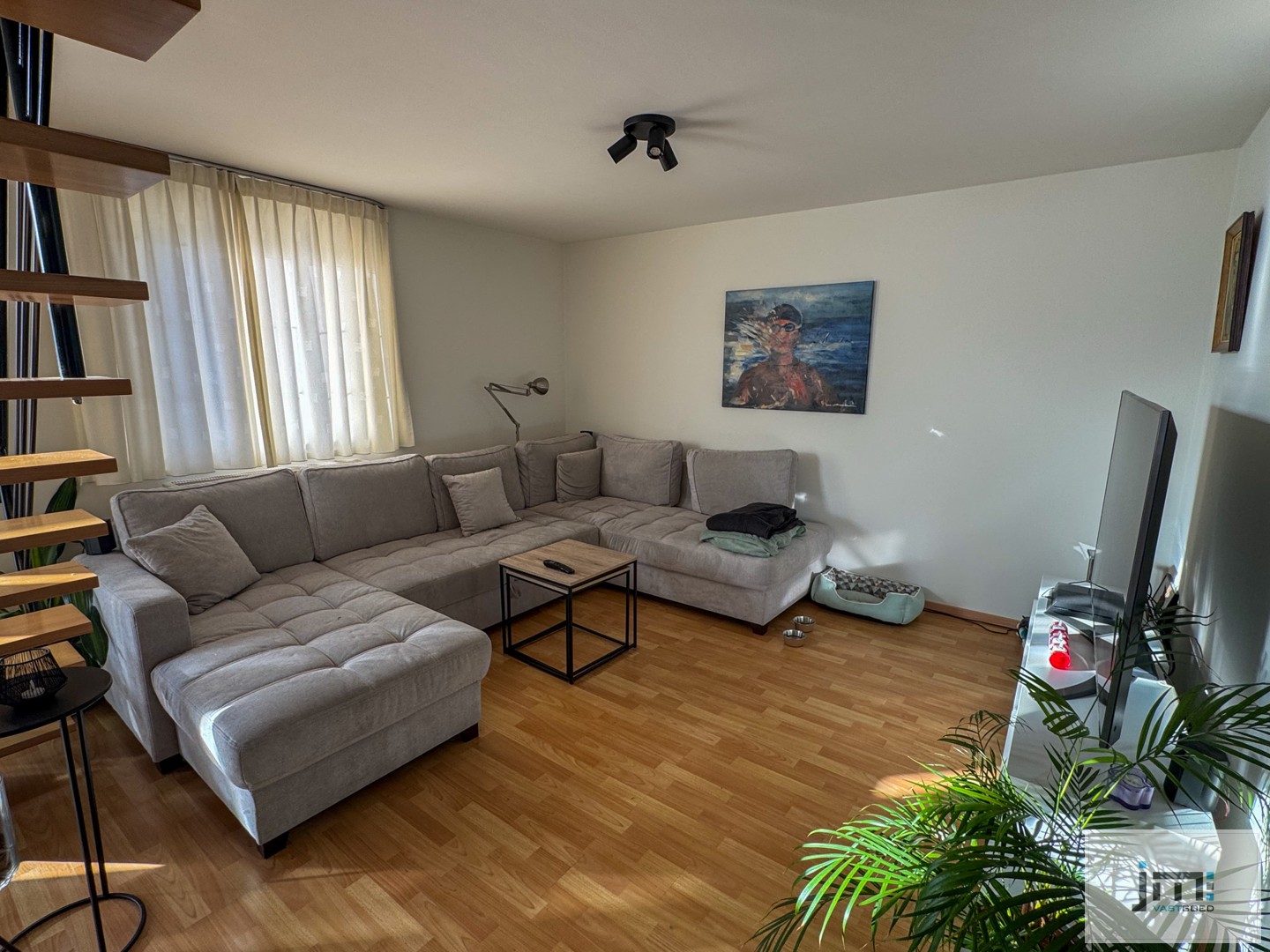 Ruim appartement met kelderberging en autostaanplaats - photo 2