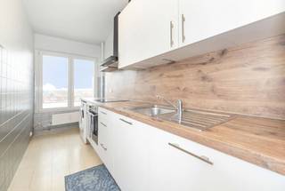 Op een steenworp van Belgica, ontdek dit charmante 1-slaapkamerappartement van ± 64 m², gelegen op de 6e verdieping van een verzorgd gebouw. Licht...