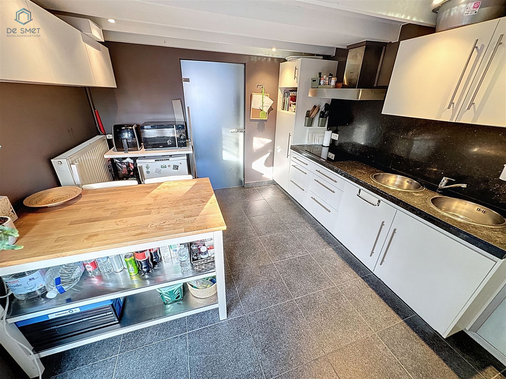 Instapklare woning met 2 slaapkamers, terras, carport en berging in Ophasselt - foto 5