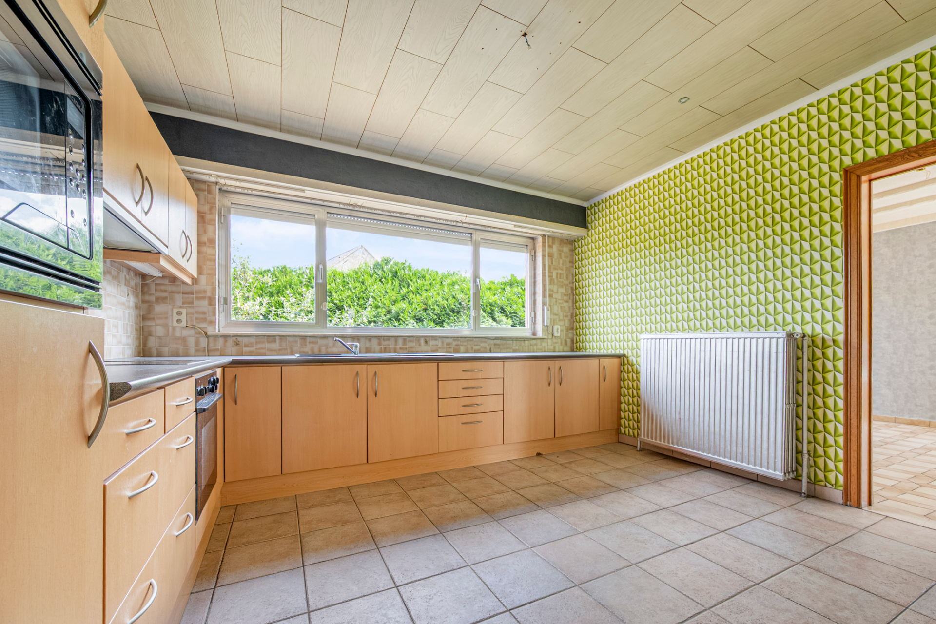 Ruime open bebouwing met 3 slaapkamers en tuin. - foto 5