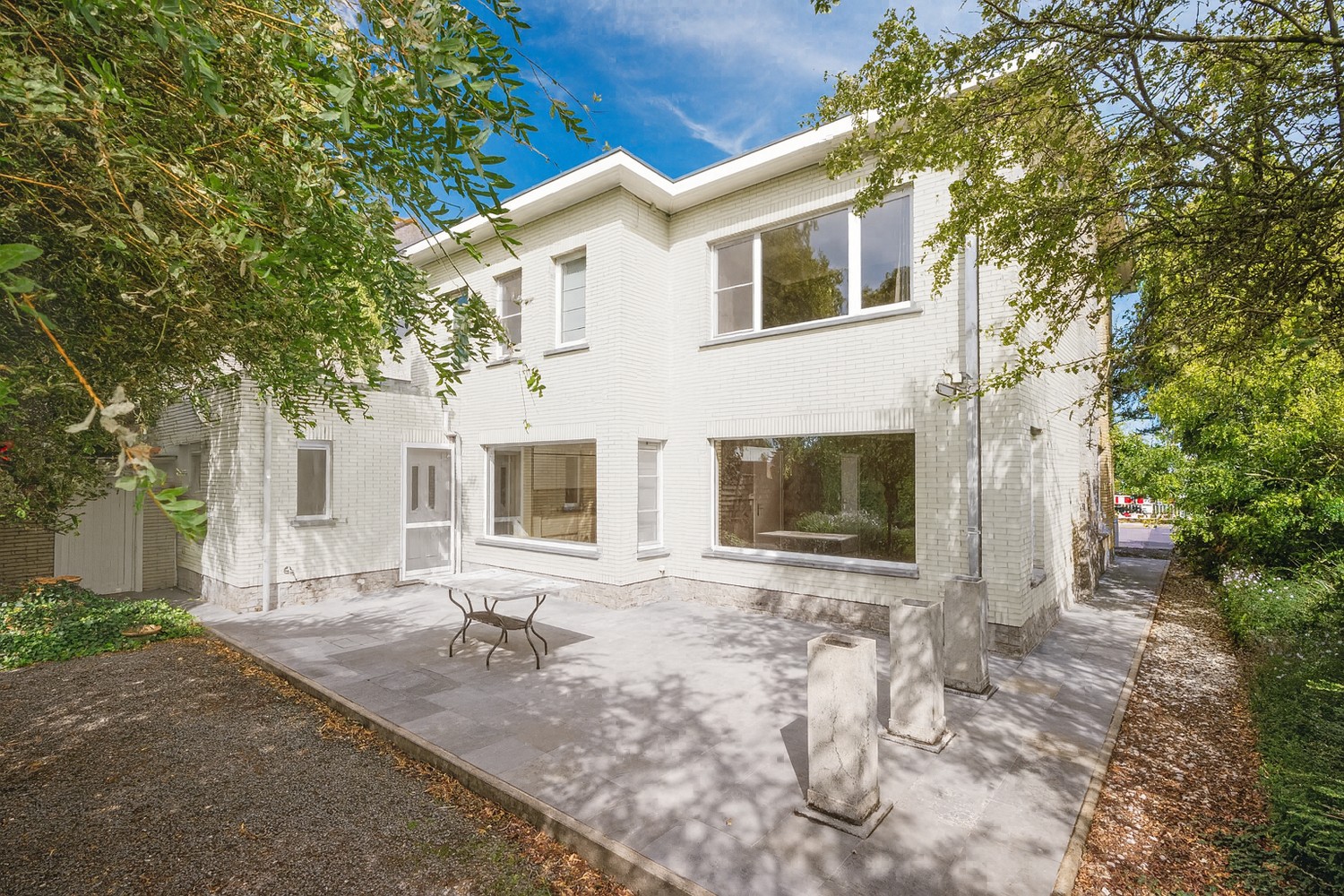 Ruime halfopen bebouwing met 5 slpks op strategische locatie in Zomergem - foto 3