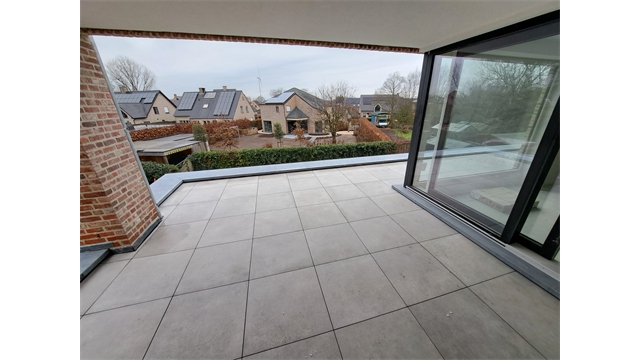 Een ruim en energiezuinig nieuwbouwappartement met terras op de eerste verdieping - foto 4