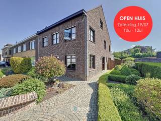 Degelijke en PERFECT ONDERHOUDEN woning met 3 s à 4 lpks, dressing, 2 garages, UITWEG achteraan en tuin met 2 LEUKE ZONNETERRASSEN te...