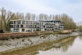 <p><span>Discover this apartment during the open house! Friday, 27/06 between 2pm and 4pm! </span></p><p><span> </span></p><p><span>HAMME - Imagine an assisted living home, disguised as an apartment, with all the luxury you are used to. Surrounded by an oasis of peace and greenery that you can enjoy from your spacious terrace.</span></p><p><span>Curious? Then definitely discover this beautiful apartment in the brand new residence 'Mirab'eau' in Hamme. </span></p><p><span> </span></p><p><span>The apartment is located along the Durme, and near the market of Hamme. In Mirabeau. Surrounded by greenery and water, and designed for carefree enjoyment.</span></p><p><span> </span></p><p><span>The main assets in a nutshell:</span></p><p><span>- Very well thought-out layout with lots of customization</span></p><p><span>- Spacious south-west facing terrace</span></p><p><span>- Magnificent views of walkway, water and greenery</span></p><p><span>- Living area (68m²) and 19 m² terrace</span></p><p><span>- New construction (2024) and sale under registration fees</span></p><p><span> </span></p><p><span>This apartment is located on the ground floor of a new construction residence (2024). You enter through an entrance hall with storage and vestiary cabinets, and have access to the living space with open kitchen. The custom interior provides a beautiful and exclusive look, and offers very large storage space. Furthermore, there is one bedroom with ensuite bathroom. The apartment features and south-west oriented terrace with beautiful views. </span></p><p><span> </span></p><p><span>The apartment is very energy efficient and is heated by underfloor heating in combination with a heat pump. The windows have screens and shutters in the bedroom. </span></p><p><span> </span></p><p><span>The residence has a stylishly landscaped park garden. The apartment is an approved assisted living residence and meets the strict standards of the Agency for Care and Health. This way, you live carefree independently in your beautiful villa apartment and can enjoy extra support when you need it.</span></p><p><span> </span></p><p><span>Sale under registration fees. In addition, you have a property tax exemption. </span></p><p><span> </span></p><p><span>VP: € 325,000 (incl. customization - sale under registration duties)</span></p><p><span>Contact Axel Lenaerts for more info and a visit!</span></p><p><span> </span></p><p><span> </span></p><p><span> </span></p>