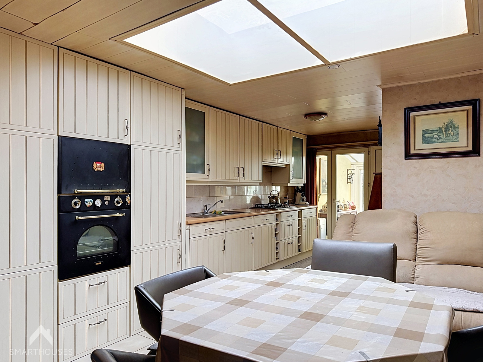 Woning met renovatiepotentieel, garage en stadstuin - foto 4