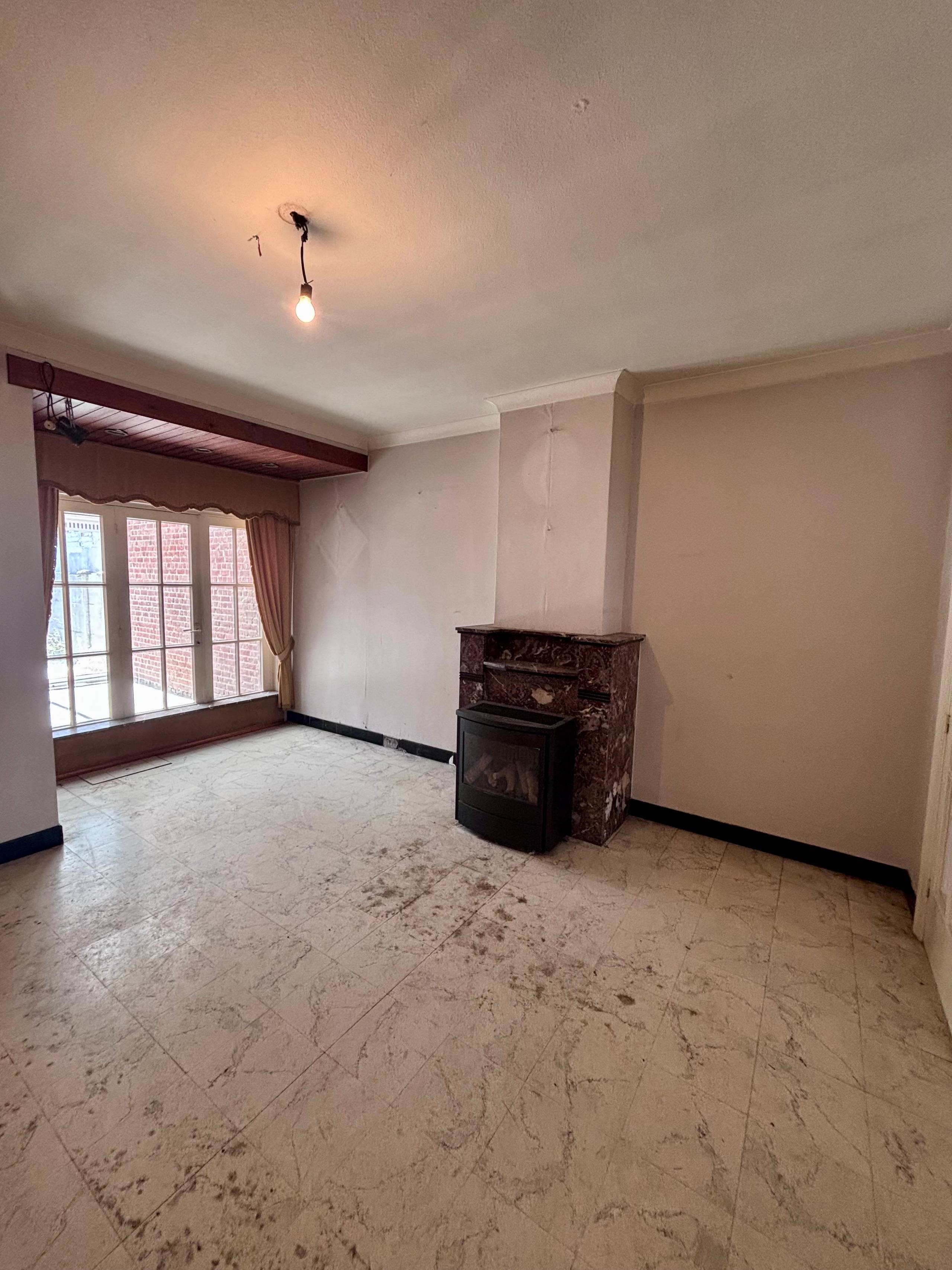 Te renoveren woning met tuin en uitweg in Dadizele - foto 5