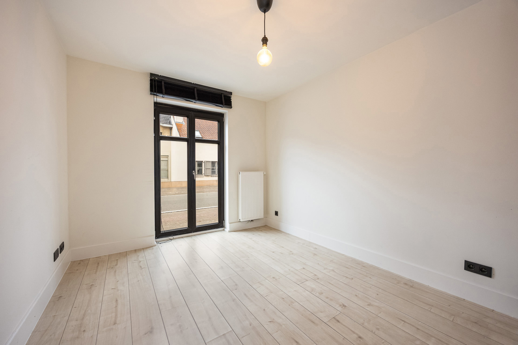 Leuk gelijkvloers appartement met tuintje en autostaanplaats - foto 5