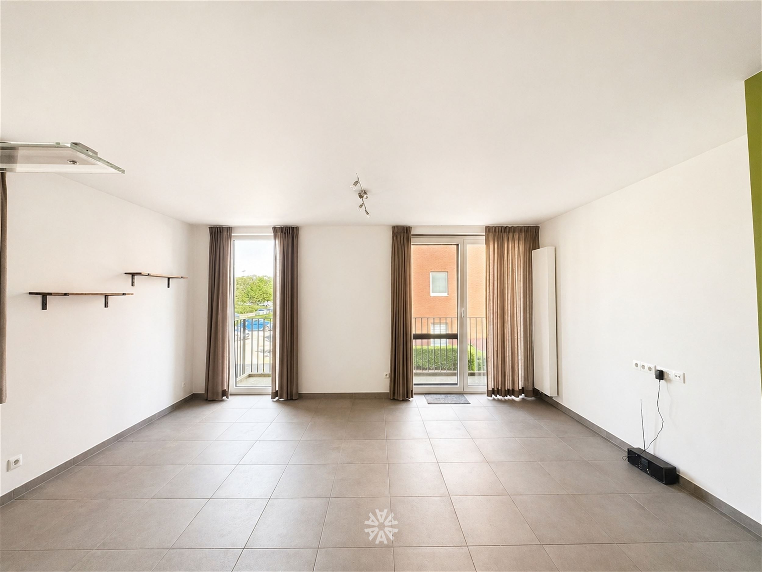 Lichtrijk appartement op uitstekende locatie te huur in Gentbrugge - foto 2