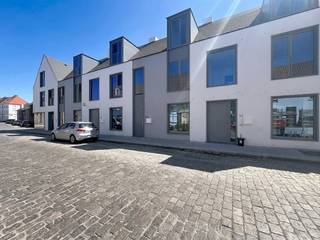 This stylish and very tastefully finished new-build home for rent is located in the Anuntiatenstraat in the center of Bruges in the quiet Saint-Gilles quarter. A few minutes' walk from the market, shops and public transport, yet quiet, which is unique in the city center.<br /><br />Layout<br />Ground floor:<br />- entrance hall with guest toilet<br />- living area with fully equipped open kitchen, finished with quality materials and appliances<br />- city garden with terrace<br />- storage space and stairs to the basement/garage<br />1st floor:<br />- bathroom 1 with bath, walk-in shower and double washbasin furniture<br />- bedroom 1<br />- bedroom 2<br />- toilet<br />- laundry and technical storage<br />2nd floor:<br />- master bedroom<br />- bathroom with walk-in shower and washbasin<br />- dressing<br />- attic room with roof window<br /><br />Advantages:<br />- comfort of a villa in the center of Bruges<br />- high quality finish<br />- parking under your own home<br />- BEN house<br /><br />Overall: <br />- Rental price: €1,750.00<br />- Available from: 01/09/2026<br /><br />