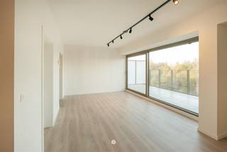 SINT-NIKLAAS - Op zoek naar een energiezuinig dakappartement in het centrum? Dan is dit stijlvolle appartement precies wat je zoekt! Enkele troeven...