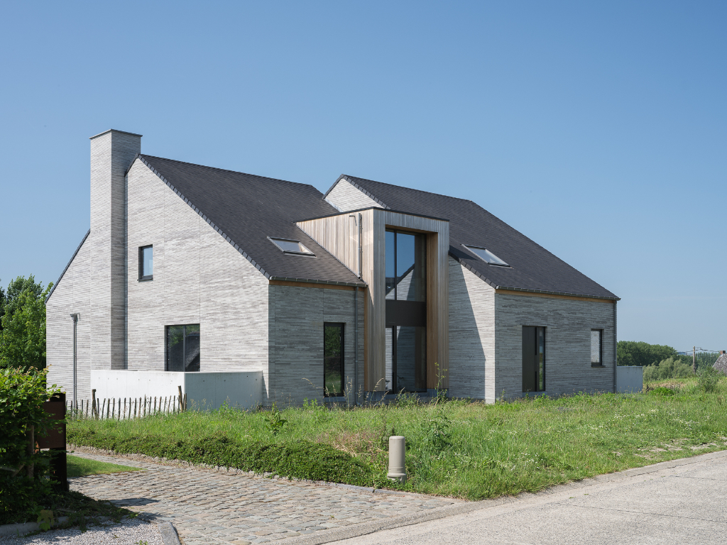Architecturale casco-nieuwbouw bestaande uit een uitzonderlijke stapelwoning met onderliggende garage en adembenemende zichten over de Scheldevallei. - foto 1