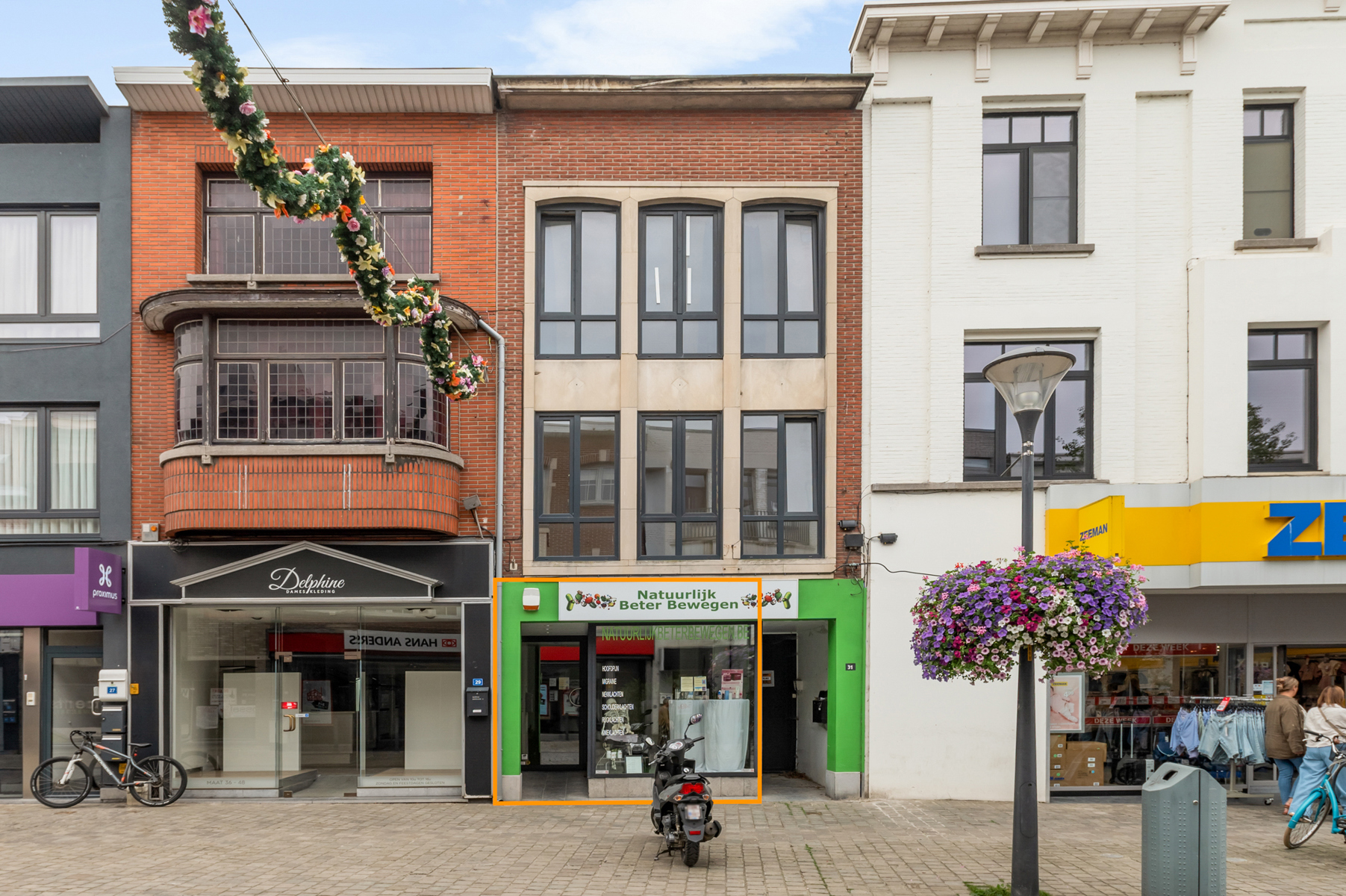 Handelszaak met Duplexappartement en Privétuin - foto 1