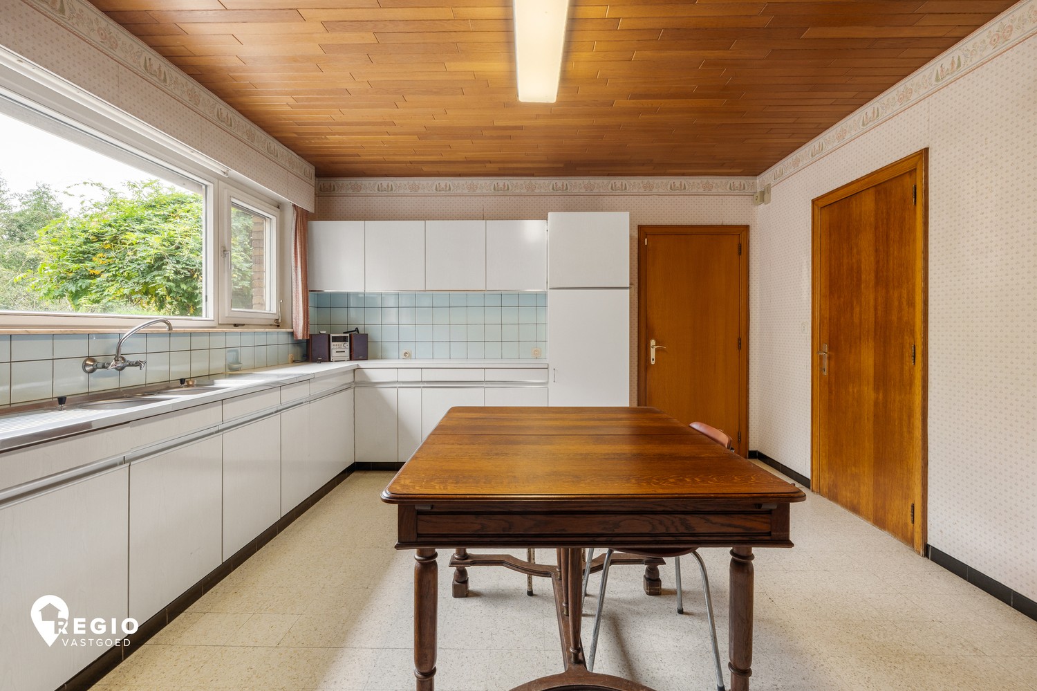 Ruime woning met 3 slaapkamers, garage en een grote tuin op een perceel van 2649 m² - foto 5
