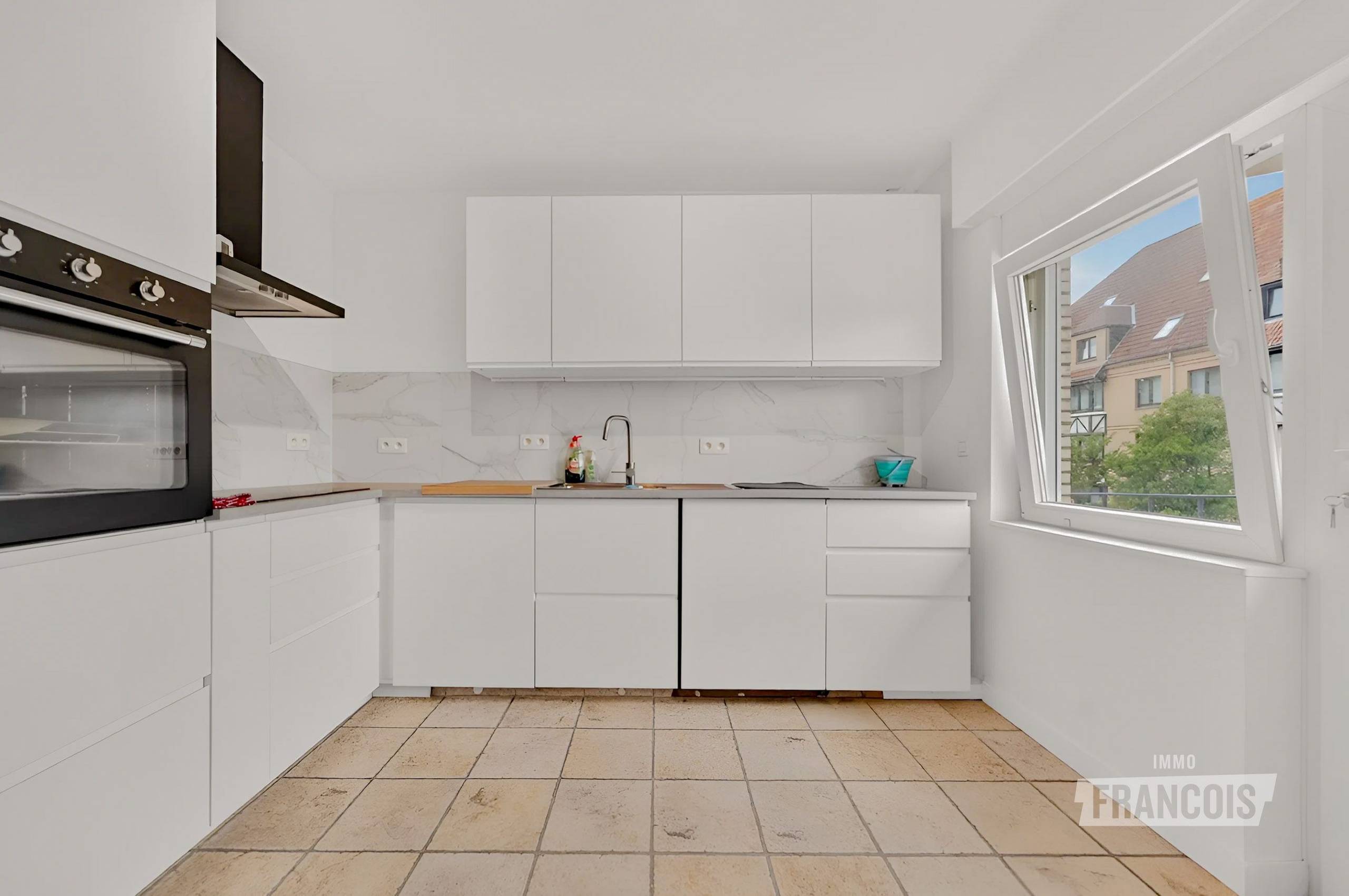 Ruim en energiezuinig appartement met 4 slaapkamers, garage en tuin in De Haan - foto 5
