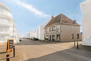 Ready to move in commercial building with multi-purpose offices/practice space above on a corner location in the shopping street in...