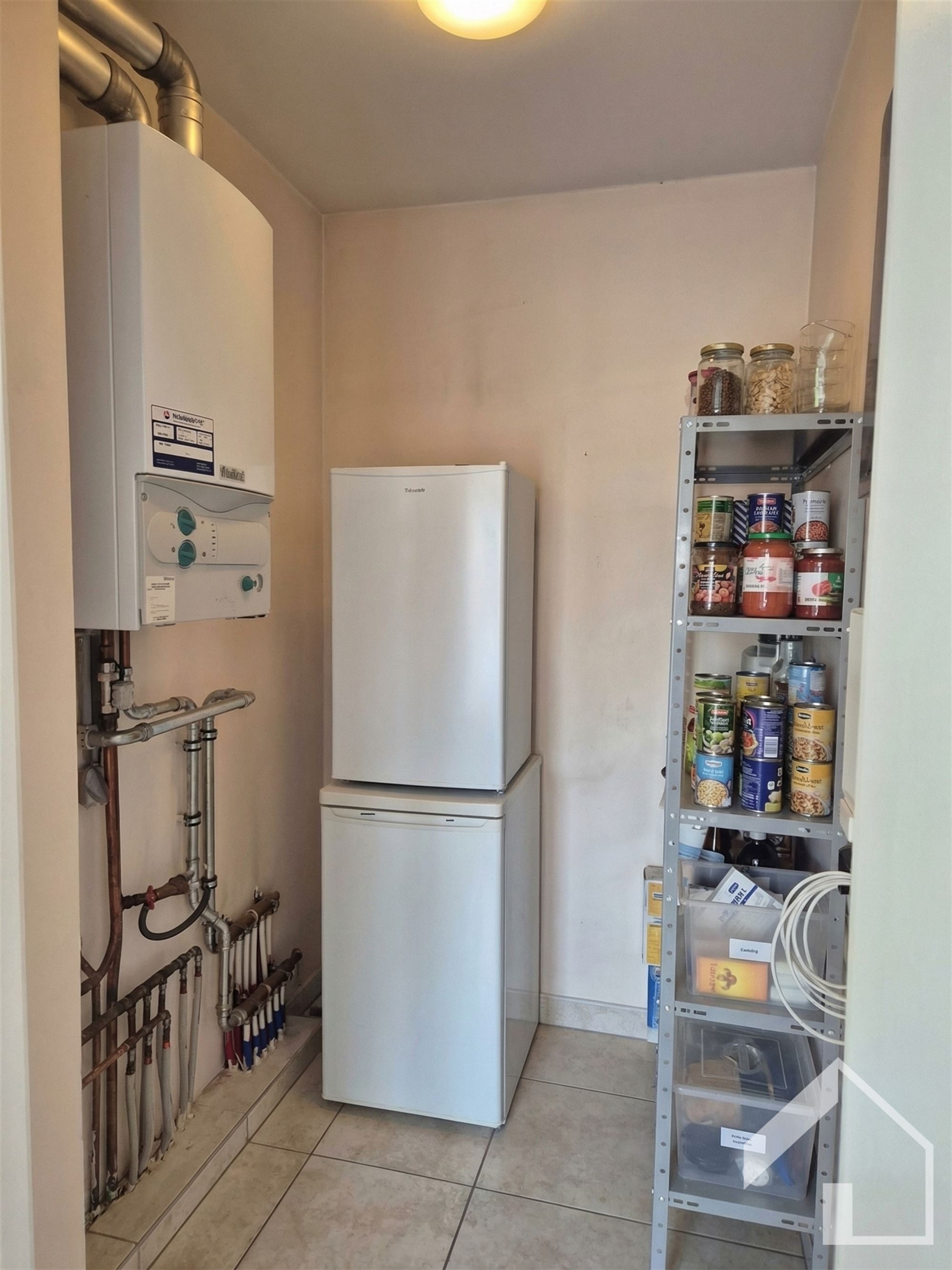 Ruim, energiezuinig appartement met 2 slaapkamers, terras, garage en lift! - foto 5