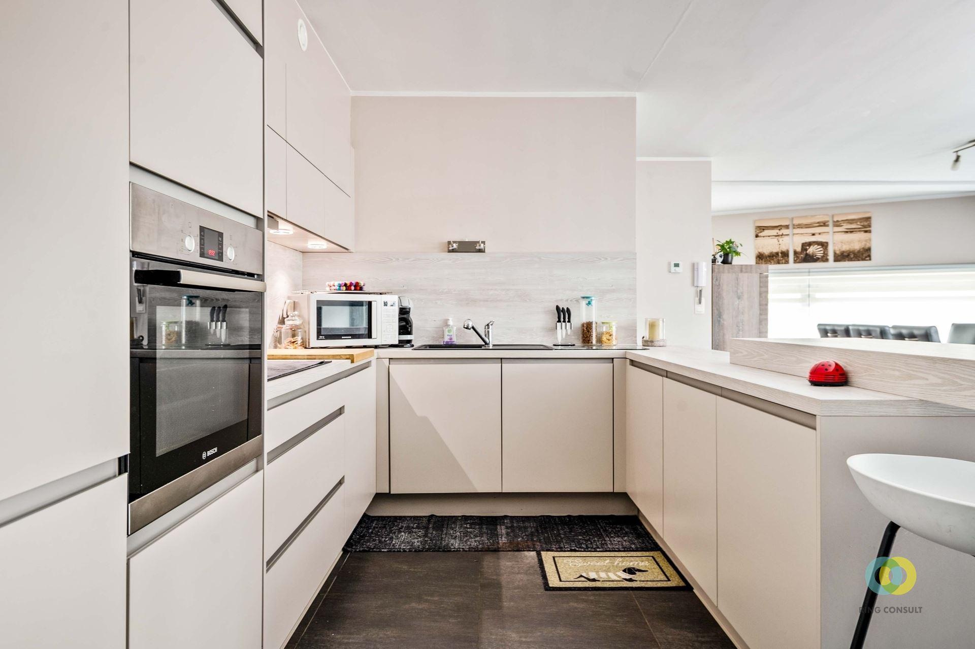 Ruim gelijkvloers appartement met terras en garagebox - foto 4
